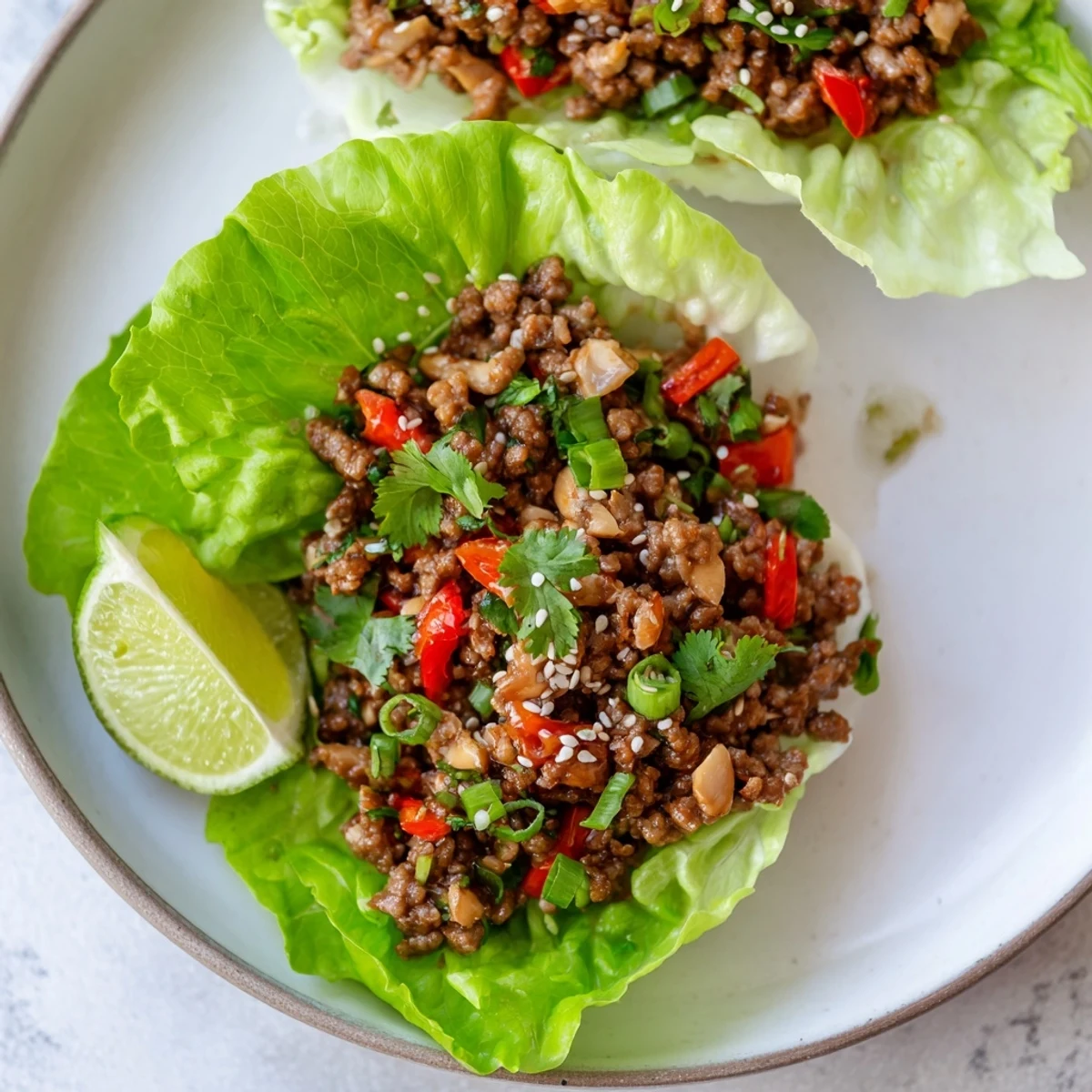 Enjoy this easy recipe: Flavorful Beef Lettuce Wraps with a delicious hoisin sauce glaze.