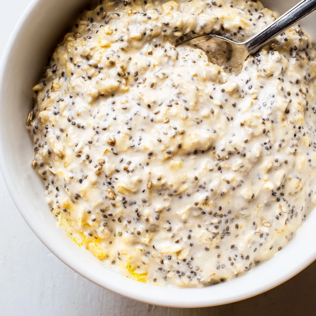 This vegan lemon poppy seed overnight oats recipe features chia seeds and almond milk for a perfect chilled morning breakfast.