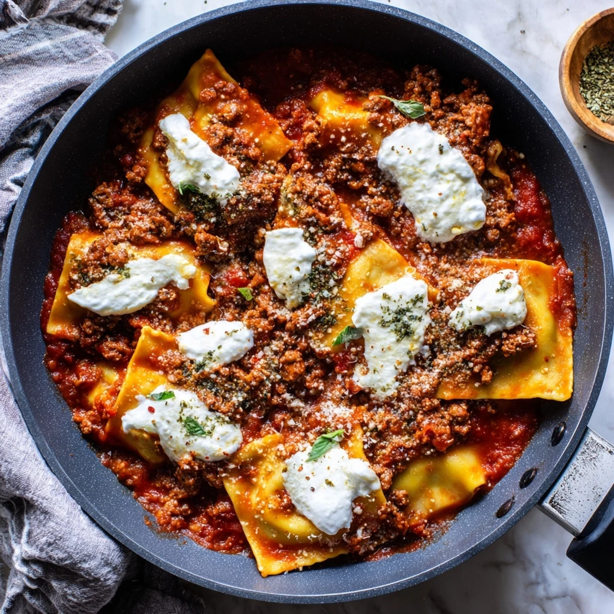 Steaming Cheats Frypan Lasagne features broken pasta sheets, rich meat sauce, and creamy ricotta, all made in one pan for weeknight dinners.
